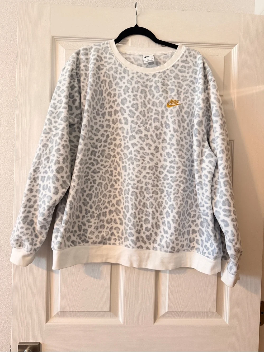 Nike Women's Gray Leopard Crewneck Sweatshirt with Gold Swoosh